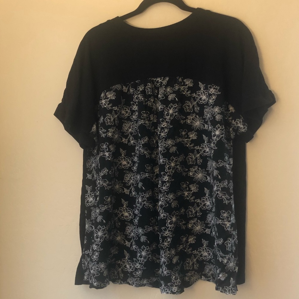 Black shirt with white flowers